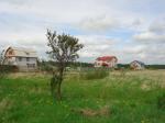 Олики уч. 15 сот. ИЖС (2 км. от Ропши по шоссе на Стрельна)